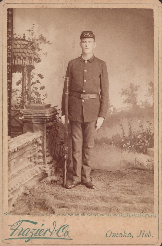 Item #26452 Vintage photograph portrait of man in full military uniform taken in Omaha, Nebraska. Military, Frazier, Co, Photography.